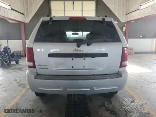 2007 Jeep Grand Cherokee Laredo with VIN 1J8GR48K67C652382, listed as a Copart auction lot 45310295 with 266,618 mi miles and Salvage Title. Bid and sale history available at carsss.com. Image 6.