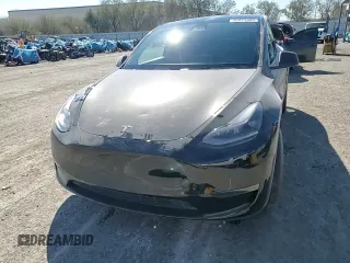 2023 Tesla Model Y Performance with VIN 7SAYGDEF7PF924355, listed as a Copart auction lot 47877055 with 64,663 mi miles and Salvage Title. Bid and sale history available at DreamBid. Image 11.