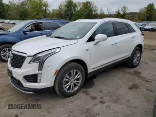 2022 Cadillac XT5 AWD Premium Luxury with VIN 1GYKNDR49NZ126779, listed as a Copart auction lot 73026344 with 18,816 mi miles and Salvage title. Bid and sale history available at DreamBid. Image 1.