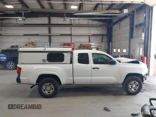2020 Toyota Tacoma SR with VIN 5TFRX5GN1LX177797, listed as a IAAI auction lot 41882427 with 107,787 mi miles and . Bid and sale history available at DreamBid. Image 14.