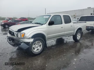 2002 Toyota Tacoma PreRunner with VIN 5TEGN92N62Z065242, listed as a Copart auction lot 57973135 with 176,684 mi miles and Salvage title. Bid and sale history available at DreamBid. Image 1.