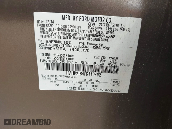 2015 Ford Taurus Limited with VIN 1FAHP2J84FG110702, listed as a IAAI auction lot 42060437 with 208,012 mi miles. Bid and sale history available at carsss.com. Image 9.