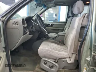 2004 GMC Envoy SLE with VIN 1GKDS13S442417232, listed as a Copart auction lot 51821225 with 242,945 mi miles and Salvage Title. Bid and sale history available at carsss.com. Image 7.