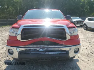 2010 Toyota Tundra 4WD Truck with VIN 5TFUY5F1XAX102227, listed as a Copart auction lot 65028044 with 48,754 mi miles and Salvage Title. Bid and sale history available at carsss.com. Image 5.