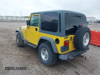 2000 Jeep Wrangler Sport with VIN 1J4FA49S3YP781614, listed as a IAAI auction lot 42292668 with 152,600 mi miles and . Bid and sale history available at DreamBid. Image 3.