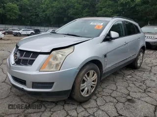 2011 Cadillac SRX z VIN 3GYFNGEY5BS673472, wystawiony jako Copart lot #58916535 z przebiegiem 150 612 mil mil oraz Czysty tytuł • Clean title. Historia ofert i sprzedaży dostępna na DreamBid. Obrazek 1.