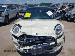 2016 MINI Hardtop 4 Door z VIN WMWXU1C50G2D08848, wystawiony jako IAAI lot #42215256 z przebiegiem 102 643 mil mil oraz . Historia ofert i sprzedaży dostępna na DreamBid. Obrazek 13.