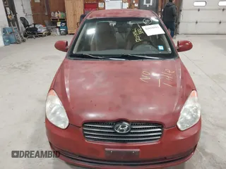 2009 Hyundai Accent Auto GLS with VIN KMHCN46C89U306436, listed as a IAAI auction lot 42010992 with 70,998 mi miles. Bid and sale history available at carsss.com. Image 6.