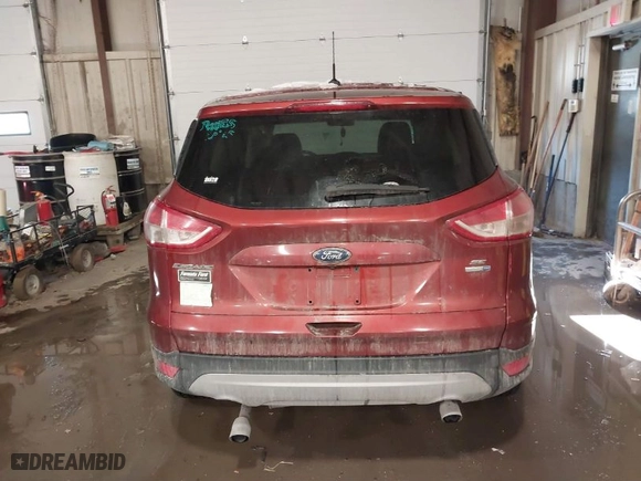 2014 Ford Escape SE with VIN 1FMCU9GX7EUA33937, listed as a IAAI auction lot 41504576 with 104,908 mi miles. Bid and sale history available at carsss.com. Image 16.