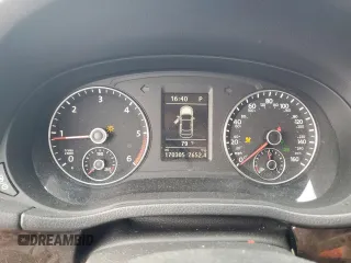 2014 Volkswagen Passat SEL Premium z VIN 1VWCN7A34EC066375, wystawiony jako Copart lot #54016005 z przebiegiem 170 305 mil mil oraz Szkoda całkowita • Salvage title. Historia ofert i sprzedaży dostępna na DreamBid. Obrazek 9.