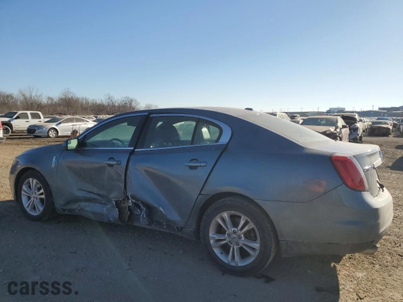2010 Lincoln MKS with VIN 1LNHL9DR7AG615897, listed as a Copart auction lot 87606245 with 215353 miles and Salvage Title. Bid and sale history available at carsss.com. Image 2.