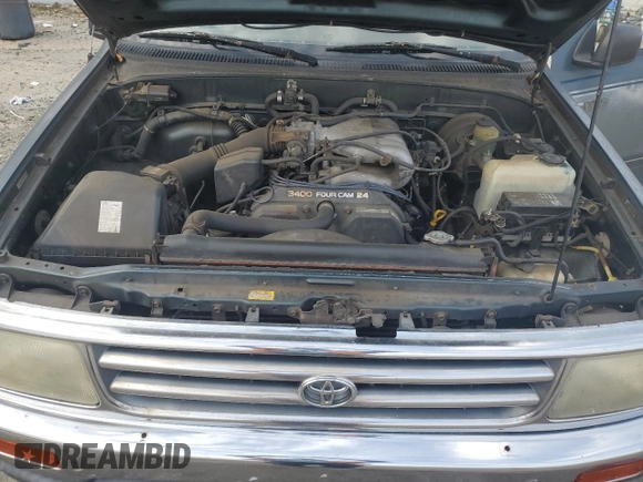 1995 Toyota T100 z VIN JT4VD22E9S0004095, wystawiony jako Copart lot #52683765 z przebiegiem 564 413 mil mil oraz Szkoda całkowita • Salvage title. Historia ofert i sprzedaży dostępna na DreamBid. Obrazek 12.