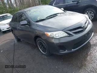 2011 Toyota Corolla L with VIN JTDBU4EE9B9135288, listed as a IAAI auction lot 41933259 with 146,039 mi miles. Bid and sale history available at carsss.com. Image 1.