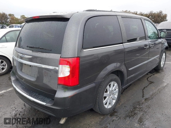2015 Chrysler Town & Country Touring with VIN 2C4RC1BG9FR720782, listed as a IAAI auction lot 41765488 with 129,889 mi miles and . Bid and sale history available at DreamBid. Image 4.