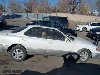 1996 Lexus ES 300 with VIN JT8BF12G2T0163288, listed as a IAAI auction lot 41371907 with 357,687 mi miles. Bid and sale history available at carsss.com. Image 13.