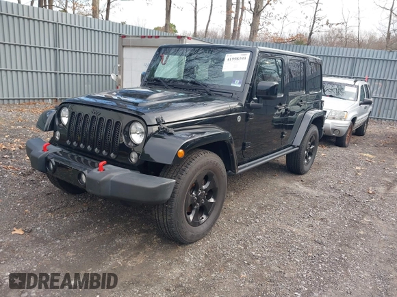 2015 Jeep Wrangler Unlimited Sahara with VIN 1C4HJWEG0FL661723, listed as a IAAI auction lot 41998393 with 89,077 mi miles. Bid and sale history available at carsss.com. Image 2.