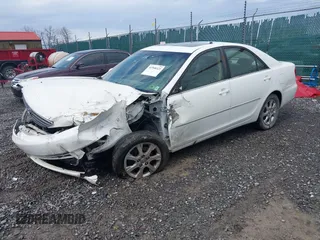 2005 Toyota Camry LE with VIN JTDBF30KX50165586, listed as a IAAI auction lot 41948322 with 84,326 mi miles and . Bid and sale history available at DreamBid. Image 2.