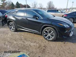 2017 Lexus RX with VIN 2T2BZMCA2HC129641, listed as a IAAI auction lot 41706579 with 81,385 mi miles. Bid and sale history available at carsss.com. Image 1.