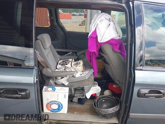 2006 Dodge Grand Caravan SE with VIN 1D4GP24R36B605743, listed as a IAAI auction lot 42068947 with 324,595 mi miles and . Bid and sale history available at DreamBid. Image 8.