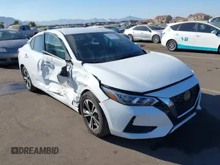 2022 Nissan Sentra SV z VIN 3N1AB8CV6NY296789, wystawiony jako IAAI lot #41029375 z przebiegiem 74 374 mil mil oraz . Historia ofert i sprzedaży dostępna na DreamBid. Obrazek 1.