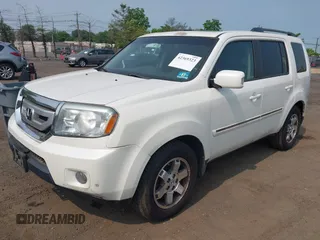 2011 Honda Pilot Touring z VIN 5FNYF4H9XBB003469, wystawiony jako IAAI lot #42369323 z przebiegiem 201 958 mil mil oraz . Historia ofert i sprzedaży dostępna na DreamBid. Obrazek 2.