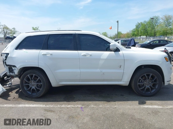 2021 Jeep Grand Cherokee Overland with VIN 1C4RJFCG6MC592296, listed as a IAAI auction lot 42170899 with 56,553 mi miles and . Bid and sale history available at DreamBid. Image 13.