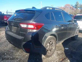 2018 Subaru Crosstrek Premium with VIN JF2GTABCXJH233021, listed as a IAAI auction lot 40963686 with 124,454 mi miles. Bid and sale history available at carsss.com. Image 4.