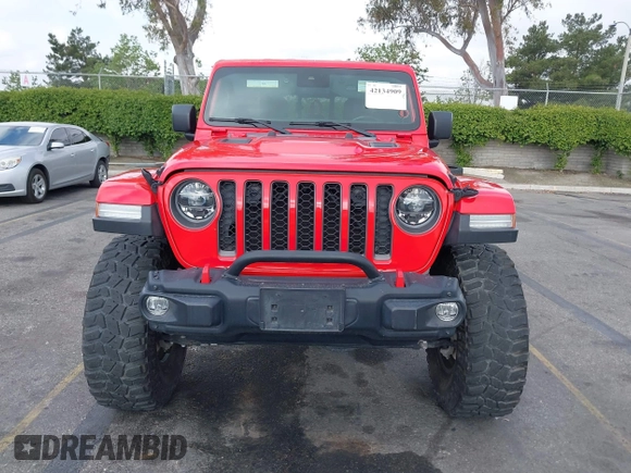 2021 Jeep Gladiator Rubicon with VIN 1C6JJTBGXML572976, listed as a IAAI auction lot 42134909 with 35,612 mi miles and . Bid and sale history available at DreamBid. Image 12.
