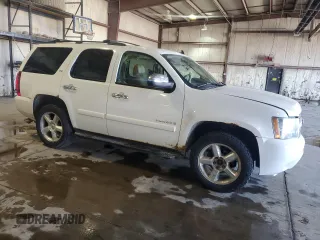 2007 Chevrolet Tahoe LTZ with VIN 1GNFK13007J313566, listed as a Copart auction lot 52498975 with 234,744 mi miles and Salvage title. Bid and sale history available at DreamBid. Image 4.