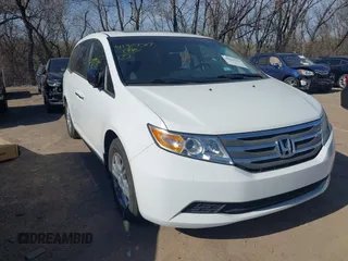 2011 Honda Odyssey EX-L with VIN 5FNRL5H69BB062666, listed as a IAAI auction lot 41829319 with 152,105 mi miles and . Bid and sale history available at carsss.com. Image 1.