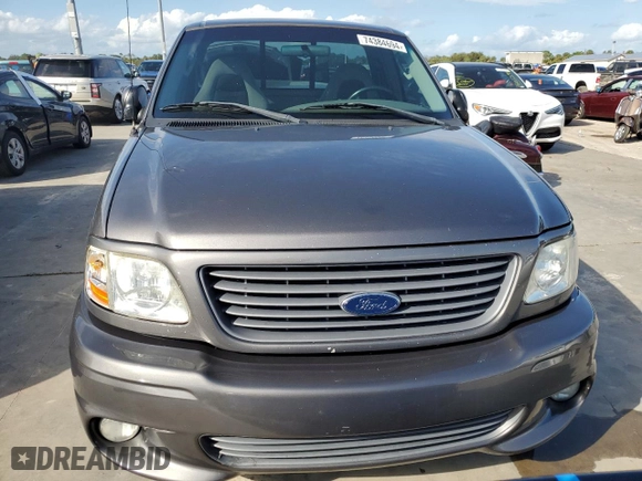 2003 Ford F-150 Lightning with VIN 2FTRF07303CA45572, listed as a Copart auction lot 74384694 with 0 mi miles and Salvage Title. Bid and sale history available at carsss.com. Image 5.