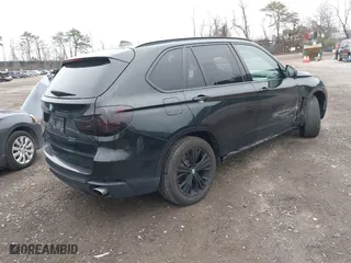 2015 BMW X5 xDrive35i with VIN 5UXKR0C54F0P00889, listed as a IAAI auction lot 42023099 with 196,387 mi miles. Bid and sale history available at carsss.com. Image 4.