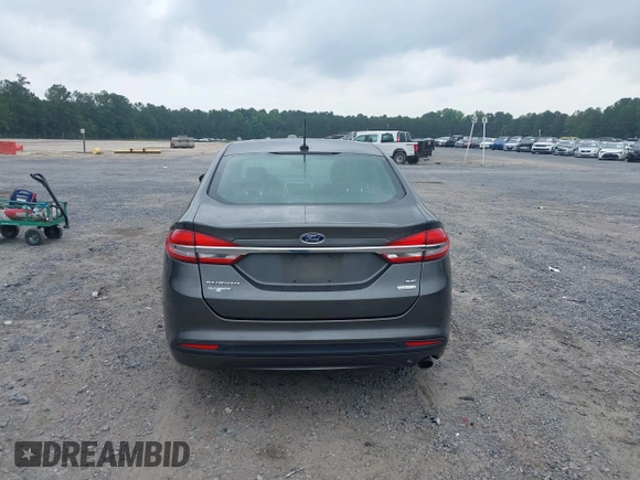 2017 Ford Fusion SE z VIN 3FA6P0HD6HR174945, wystawiony jako IAAI lot #42416548 z przebiegiem 128 410 mil mil oraz . Historia ofert i sprzedaży dostępna na DreamBid. Obrazek 16.