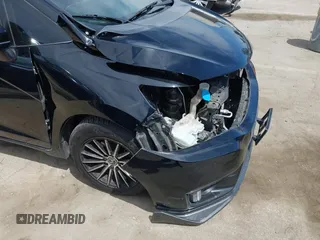 2017 Honda Fit LX with VIN JHMGK5H51HS012176, listed as a IAAI auction lot 42011477 with 91,894 mi miles. Bid and sale history available at carsss.com. Image 19.