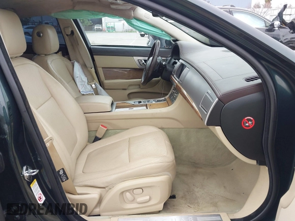 2010 Jaguar XF Supercharged with VIN SAJWA0HE8AMR78233, listed as a IAAI auction lot 41658411 with 69,158 mi miles. Bid and sale history available at carsss.com. Image 5.