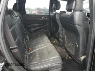 2014 Jeep Grand Cherokee Summit with VIN 1C4RJFJG1EC323658, listed as a Copart auction lot 50740115 with 253,656 mi miles and Salvage title. Bid and sale history available at DreamBid. Image 11.