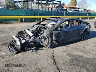 2022 Tesla Model S z VIN 5YJSA1E56NF464984, wystawiony jako Copart lot #53990385 z przebiegiem Nie podano mil oraz Nie do naprawy • Non repairable. Historia ofert i sprzedaży dostępna na DreamBid. Obrazek 1.