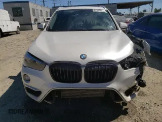 2018 BMW X1 sDrive28i with VIN WBXHU7C31J5H44190, listed as a Copart auction lot 67802544 with 96,973 mi miles and Clean Title. Bid and sale history available at carsss.com. Image 5.