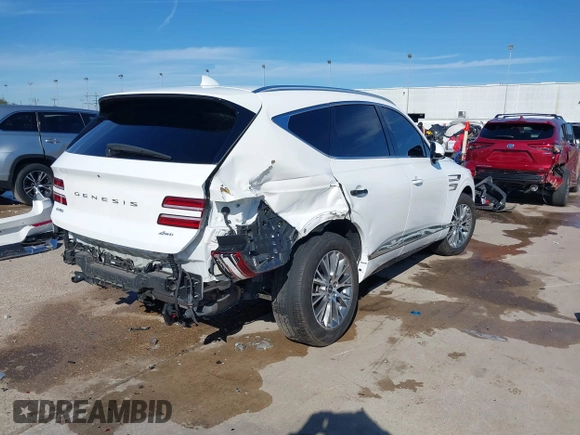 2023 Genesis GV80 with VIN KMUHBDSB0PU140228, listed as a IAAI auction lot 41253270 with 33,467 mi miles and . Bid and sale history available at DreamBid. Image 4.