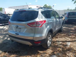 2014 Ford Escape SE with VIN 1FMCU9GX9EUD13214, listed as a IAAI auction lot 41973339 with 172,845 mi miles. Bid and sale history available at carsss.com. Image 4.
