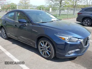 2018 Mazda 3 Grand Touring with VIN 3MZBN1W36JM213063, listed as a IAAI auction lot 42102460 with 49,180 mi miles and . Bid and sale history available at DreamBid. Image 1.