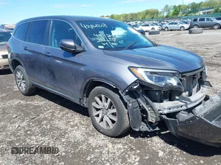 2020 Honda Pilot EX-L z VIN 5FNYF6H51LB038606, wystawiony jako IAAI lot #42161208 z przebiegiem 49 763 mil mil oraz . Historia ofert i sprzedaży dostępna na DreamBid. Obrazek 1.