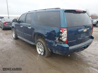 2007 Chevrolet Suburban LTZ with VIN 3GNFK16377G260369, listed as a IAAI auction lot 41124197 with 160,789 mi miles. Bid and sale history available at carsss.com. Image 3.