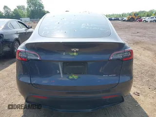 2021 Tesla Model Y Long Range z VIN 5YJYGDEE7MF140144, wystawiony jako IAAI lot #42350137 z przebiegiem Nie podano mil oraz . Historia ofert i sprzedaży dostępna na DreamBid. Obrazek 15.