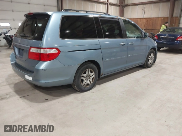 2006 Honda Odyssey EX-L with VIN 5FNRL38726B078467, listed as a IAAI auction lot 41874268 with 178,580 mi miles and . Bid and sale history available at DreamBid. Image 4.