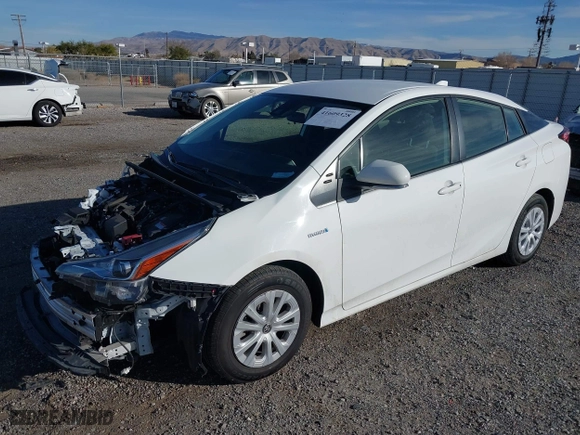 2021 Toyota Prius L Eco with VIN JTDKAMFU9M3150667, listed as a IAAI auction lot 41609328 with 59,177 mi miles. Bid and sale history available at carsss.com. Image 18.