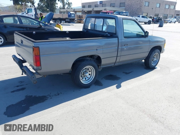 1988 Nissan Hardbody z VIN 1N6ND11S0JC345025, wystawiony jako IAAI lot #41899460 z przebiegiem 132 502 mil mil oraz . Historia ofert i sprzedaży dostępna na DreamBid. Obrazek 4.