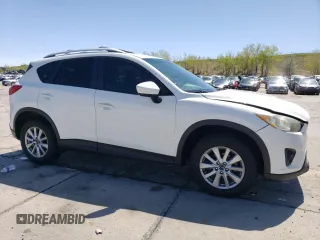 2014 Mazda CX-5 Touring z VIN JM3KE4CYXE0393443, wystawiony jako Copart lot #54738705 z przebiegiem 68 220 mil mil oraz Szkody całkowita. Historia ofert i sprzedaży dostępna na DreamBid. Obrazek 4.