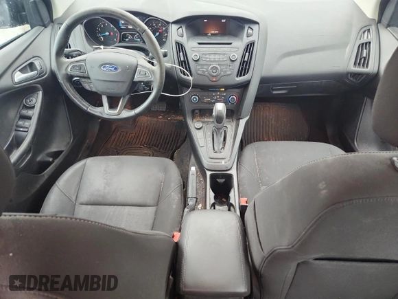 2016 Ford Focus SE z VIN 1FADP3F21GL262289, wystawiony jako Copart lot #60318515 z przebiegiem 79 529 mil mil oraz Szkoda całkowita • Salvage title. Historia ofert i sprzedaży dostępna na DreamBid. Obrazek 8.