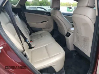 2016 Hyundai Tucson Limited z VIN KM8J33A25GU140802, wystawiony jako Copart lot #56249745 z przebiegiem 86 976 mil mil oraz Szkoda całkowita • Salvage title. Historia ofert i sprzedaży dostępna na DreamBid. Obrazek 11.